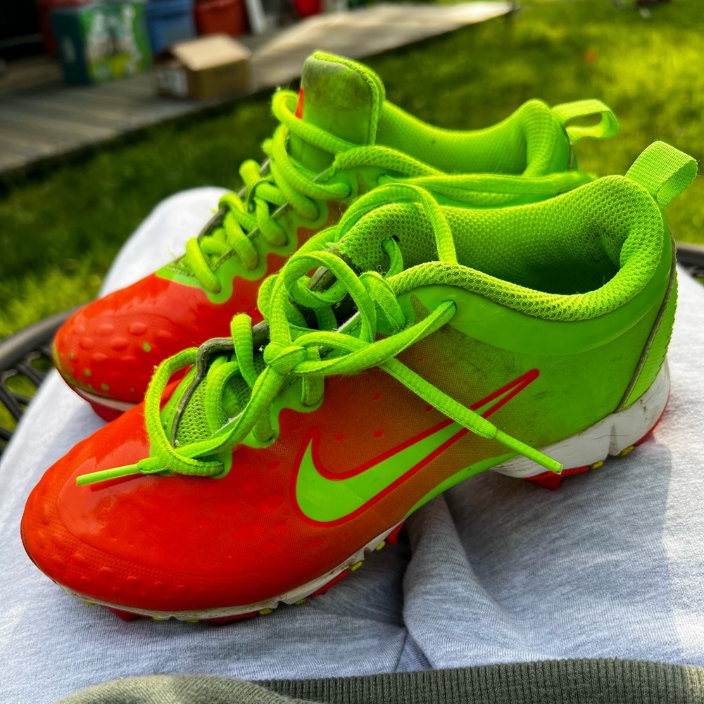 Nike Kids' Neon Green and Orange Athletic Shoes cleats.